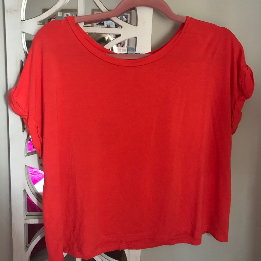orange cropped shirt